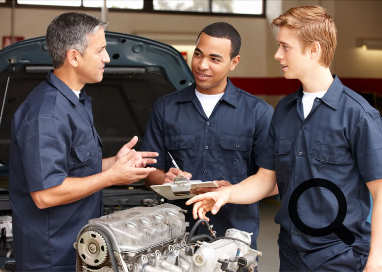 An image showing a Team leader using ToC techniques to train two apprentices 